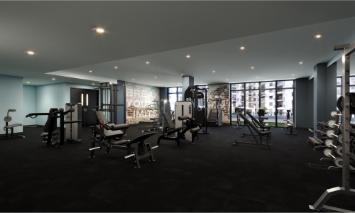 fitness center with open spaces and bright lighting through the windows