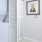 a closet with a washer and dryer unit